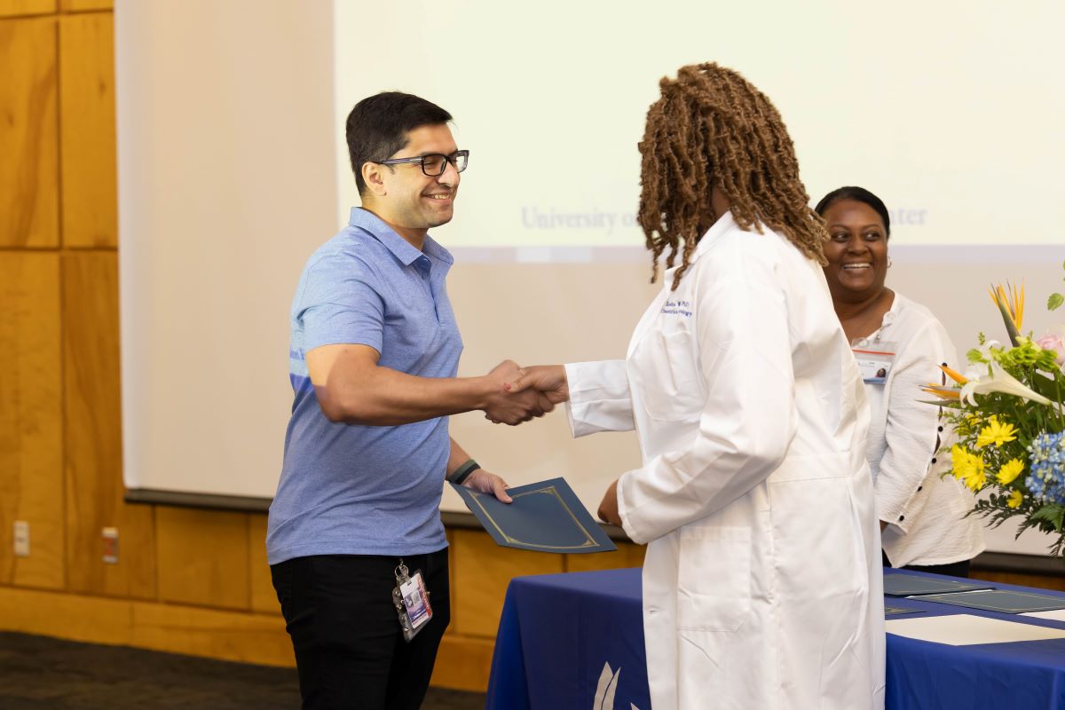 Student accepting an award at the 2023 Honors and Awards Ceremony